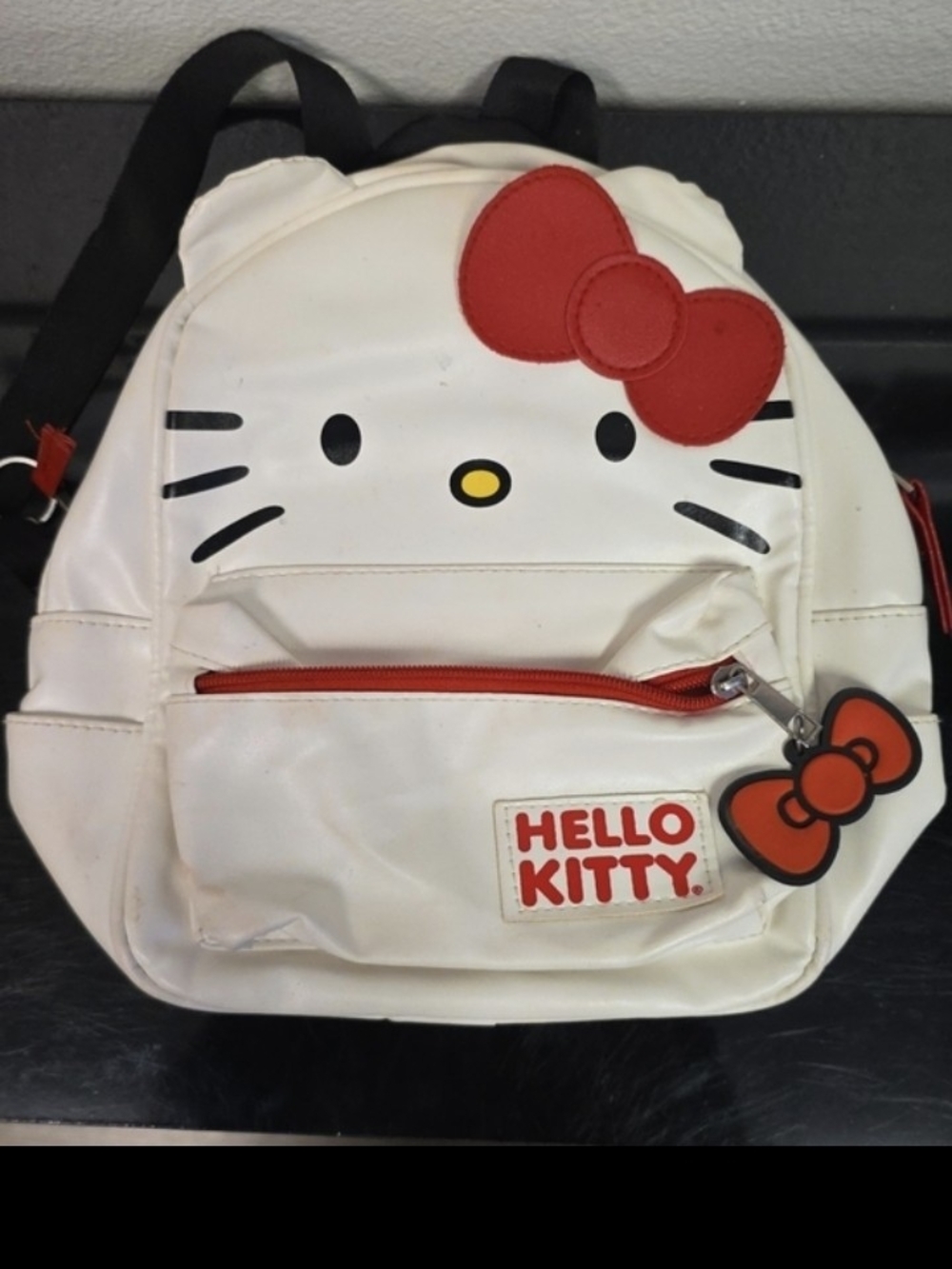 Sanrio Hello Kitty Signature Bow Face White Faux Leather Mini Backpack